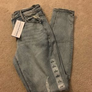 distressed light wash jeans